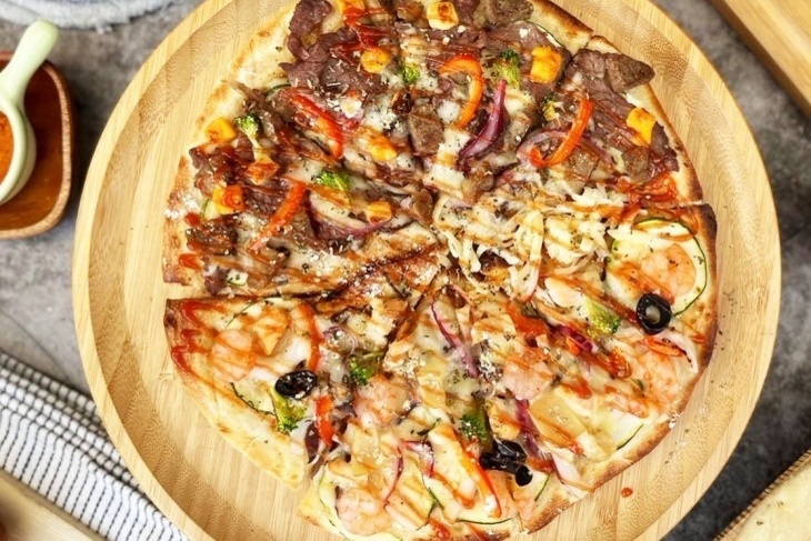 給我咬一口新式窯烤披薩