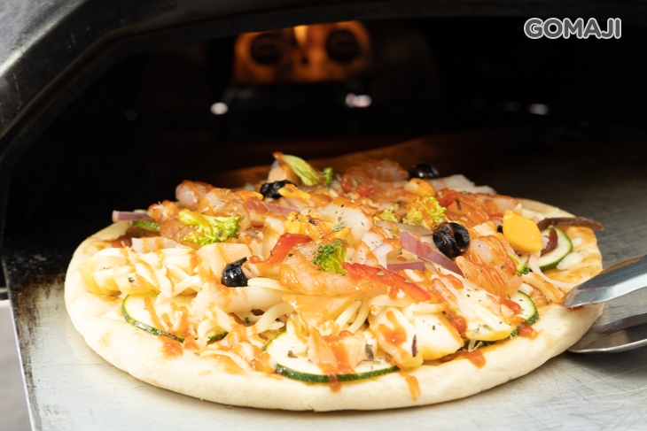 給我咬一口新式窯烤披薩