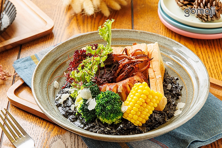 墨魚透抽燉飯