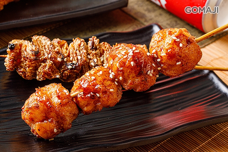  烤豬肉串一份 + 米腸一份 + 豆皮一份 + 花枝丸一份