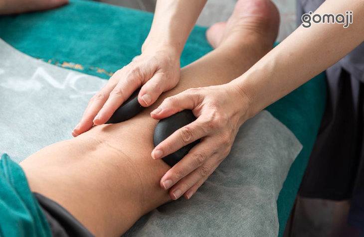 能量熱石按摩腿部